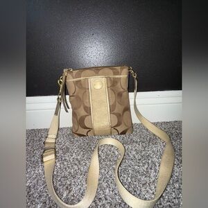 Coach tan and gold crossbody bag